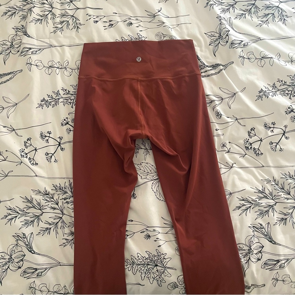 Selling lulu leggings, pretty red copper color, nothing wrong with them